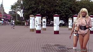 Blonde group participates in public humiliation bondage event.