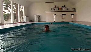 Outdoor pool sex: lesbian fingering and fisting