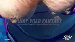 Busty Filipina wife shows off her big tits in the outdoor pool