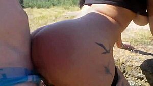 Stunning Brunette Enjoys Doggystyle Action Outdoors with Friend