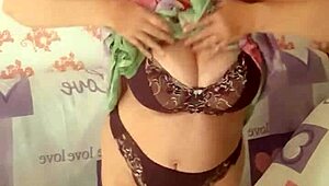 Mariaold stripping and playing with her pussy