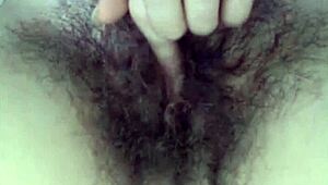 This hairy teen performs on webcam with her natural body.