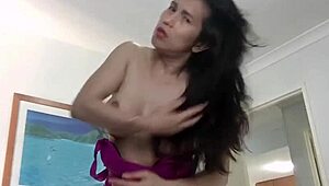 Asian Ladyboy Jerks Off Her 7-Inch Cock On Webcam!