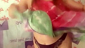 Mariaold stripping and playing with her pussy