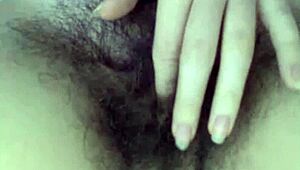 This hairy teen performs on webcam with her natural body.