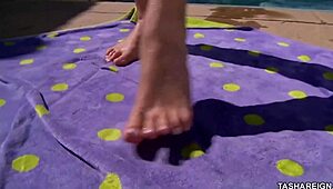 Tasha Reign SUN BATHES while MASTURBATING her shaved pussy!