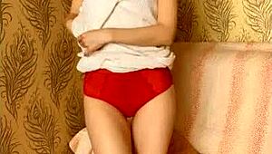 She rips clothes for shaved pussy striptease.