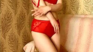 She rips clothes for shaved pussy striptease.