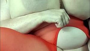 Lady with huge tits lies back enjoying a massive BBC toy session