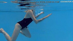 Mimi Cica's sensual underwater stripping and erotic play