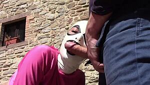 laura sucks cock outdoors in pink outfit and heels