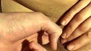 milf reaches orgasm with fingering and clit rubbing techniques.