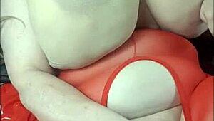 Lady with huge tits lies back enjoying a massive BBC toy session