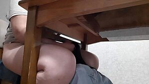 Secretary intensely licks pussy under office table for orgasm.