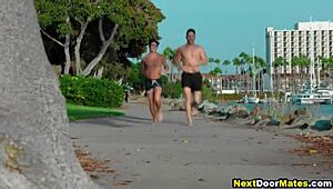 Athletic guys practice yoga and workout together