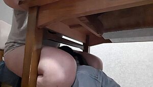 Secretary intensely licks pussy under office table for orgasm.