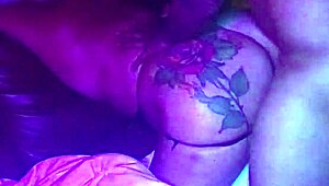 A mature Brazilian woman with a curvy behind enjoys a large black shaft during her professional journey