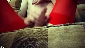 Dana Devine looks hot as a crossdresser in red tights 😍