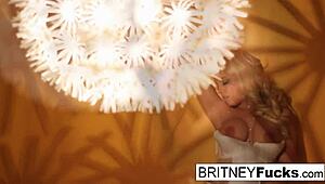 Sexy blonde pornstar teases her big tits and ass in a retro solo scene