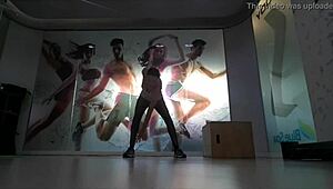 Cute blonde teen warms up at gym