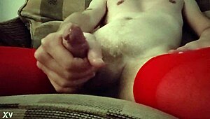Dana Divine, a transsexual performer, dons red tights for crossdressing fetish