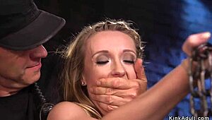 tied up blonde slave choked and whipped
