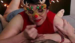 christmas couple enjoys handjob and blowjob with cum