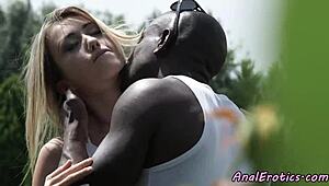 Young babe takes a big black cock deep in her ass outdoors with slow thrusts