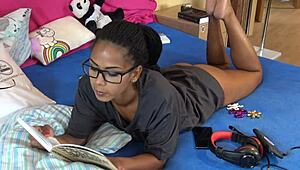 isabella reading in t-shirt and panties, showing off her sexy legs and ass