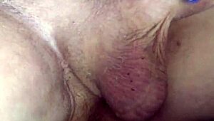 Shaved amateur masturbates with precum close-up