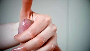 Learn how to slowly lube and handjob a monster cock for an explosive cumshot!