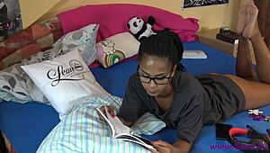 isabella reading in t-shirt and panties, showing off her sexy legs and ass