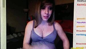 this pregnant webcam cutie is showing off her boobs and pussy while singing