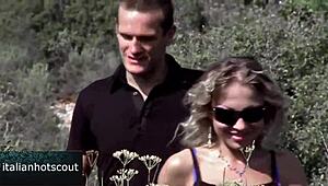 Blonde girl with light eyes outdoors