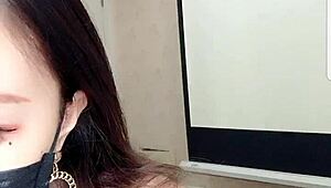 asian babe drinks milk on cam