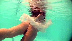 Russian Naked Babe Natalia Swims and Strips in Pool
