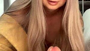 Pretty milf gives handjob to friend