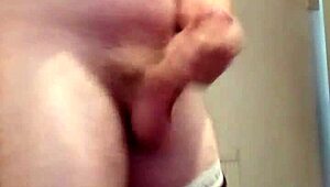Horny Brit Wanks Huge Cock at Home