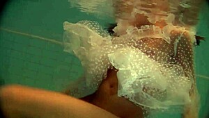 Russian Naked Babe Natalia Swims and Strips in Pool