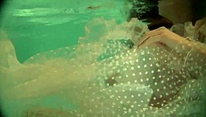 Russian Naked Babe Natalia Swims and Strips in Pool