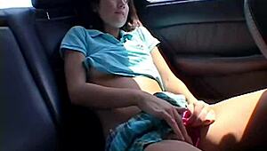 Chloe's solo car play: natural tits and pussy fingering