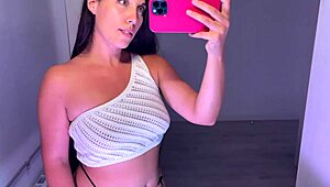 amateur brunette trying on tops in haul