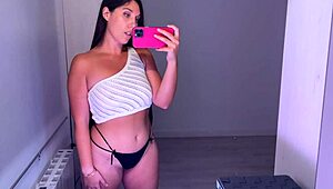 amateur brunette trying on tops in haul