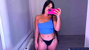 amateur brunette trying on tops in haul