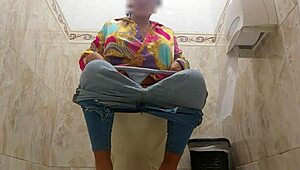 Madrid airport restroom exhibitionism with a focus on ebony and Latina women