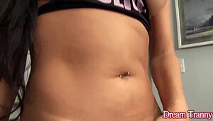 Trans hottie Sula Camargo enjoys solo play with a rubber toy