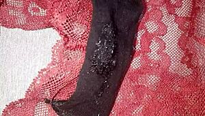 A huge load of cum spills on my friend's burgundy panties.