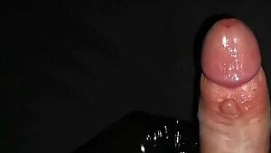 Gently masturbate horny big dick with latex gloves and lube.