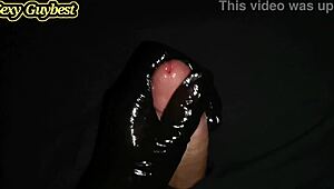 Gently masturbate horny big dick with latex gloves and lube.
