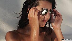 petra red in summer erotica, getting wet and oiled for a hot photography session on xczech com